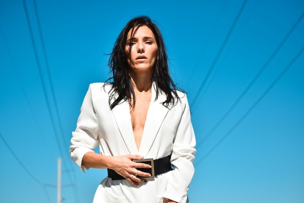 How to Style a Sleeveless Blazer for a Chic British Summer Office Look?